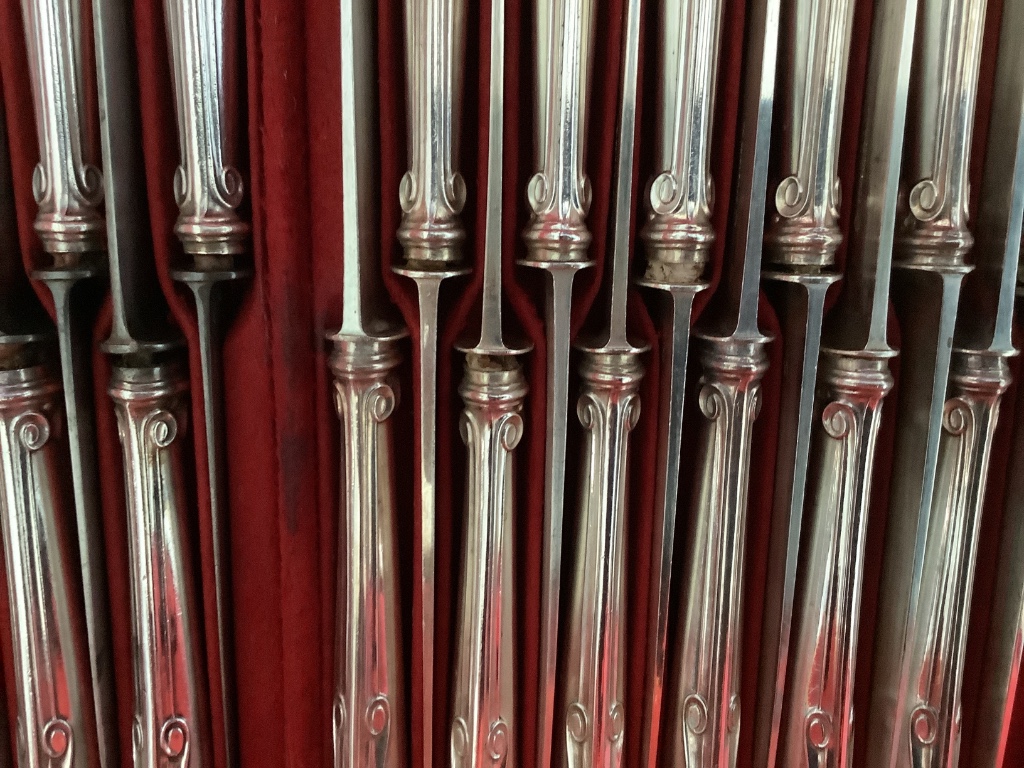 A late 19th century French canteen of silver 950 standard cutlery, in a brass mounted oak canteen, by Prevost Recipon & Cie (Maison Odiot)